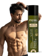 Tiger shroff looking down with a hand in his hair, standing next to a can of PROWL Body Hair Removal Spray.