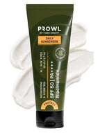 PROWL Daily Sunscreen tube standing upright against a background of thick white cream swatches.