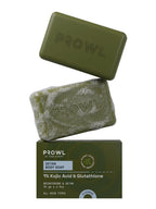 Stack showing a dry PROWL Detan Body Soap, a lathered soap, and the green product packaging box.