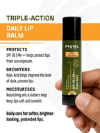 Hand holding PROWL Daily Lip Balm next to text detailing a triple-action formula that protects, brightens, and hydrates.